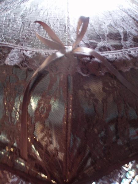 Ombrelle en vinyl et en dentelle